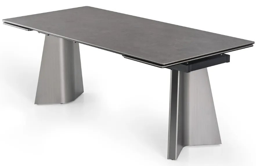 Nowoczesny stół rozkładany Nexus 200(280)×90 cm zachwyca eleganckim białym blatem z masy ceramicznej i solidną podstawą ze stali szczotkowanej. Styl, trwałość i funkcjonalność w jednym – idealny do jadalni i salonu.