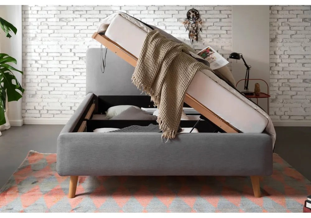 Szare tapicerowane łóżko dwuosobowe ze schowkiem ze stelażem 140x200 cm Mattis – Meise Möbel