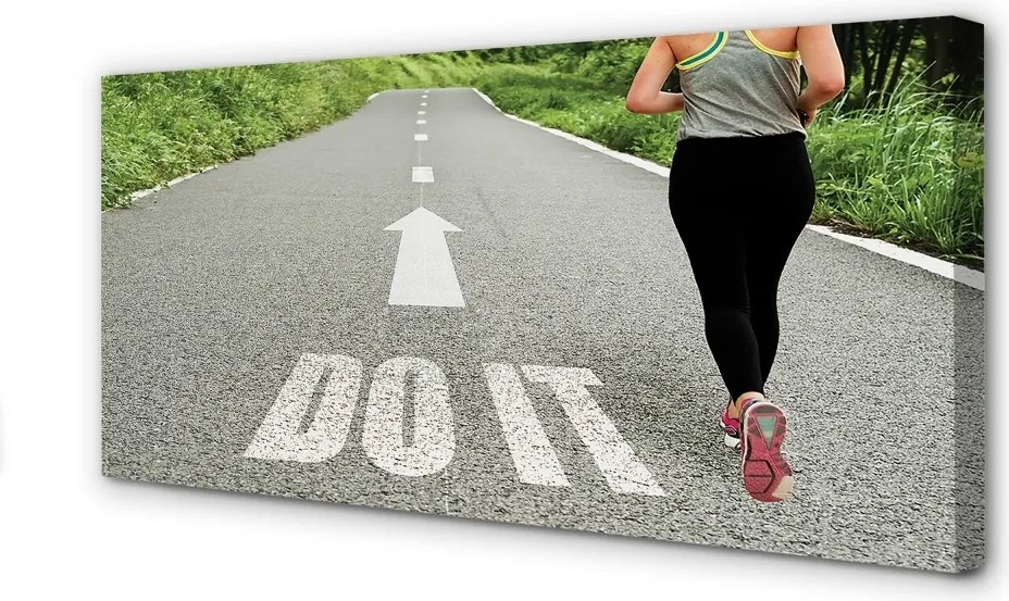 Obraz canvas na ścianę Kobieta Biegnąca Drogą