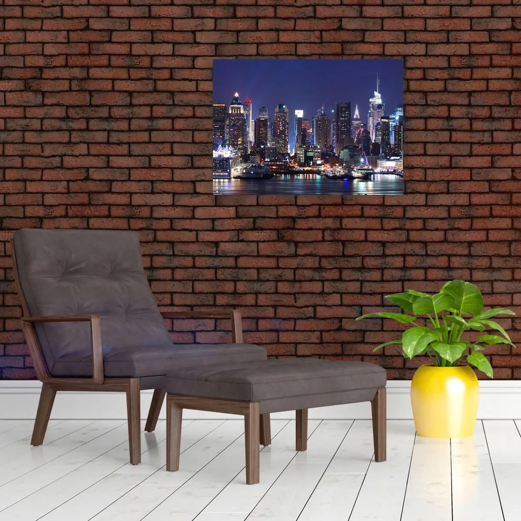 Obraz na szkle - Podświetlone nowojorskie drapacze chmur (70x50 cm)