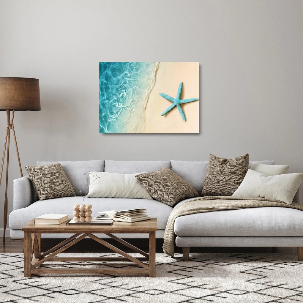 Obraz na szkle - Rozgwiazda na plaży (70x50 cm)