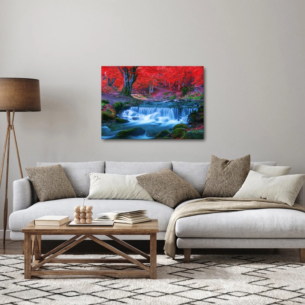 Obraz wodospadu w czerwonym lesie (70x50 cm)