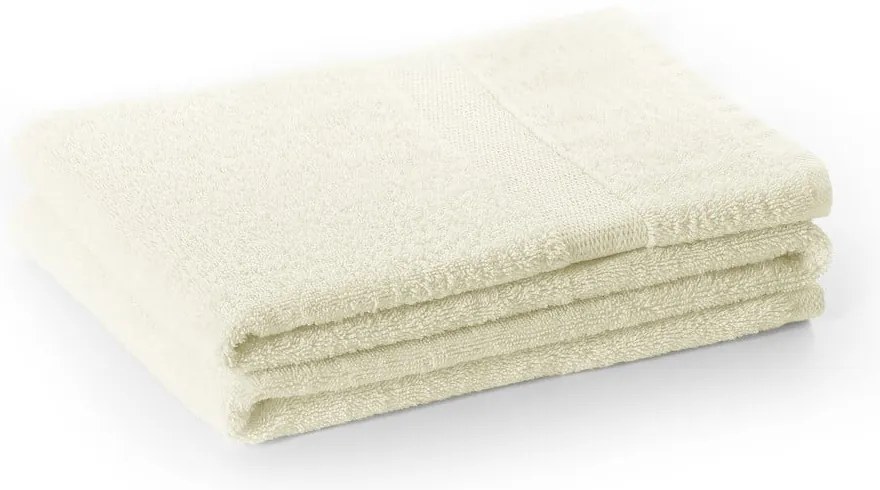 Kremowy bawełniany ręcznik frotte 30x50 cm Marina – DecoKing