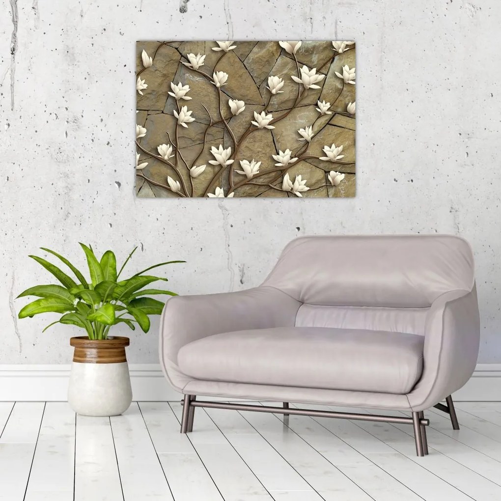 Obraz na szkle - Białe magnolie na murze kamiennym (70x50 cm)