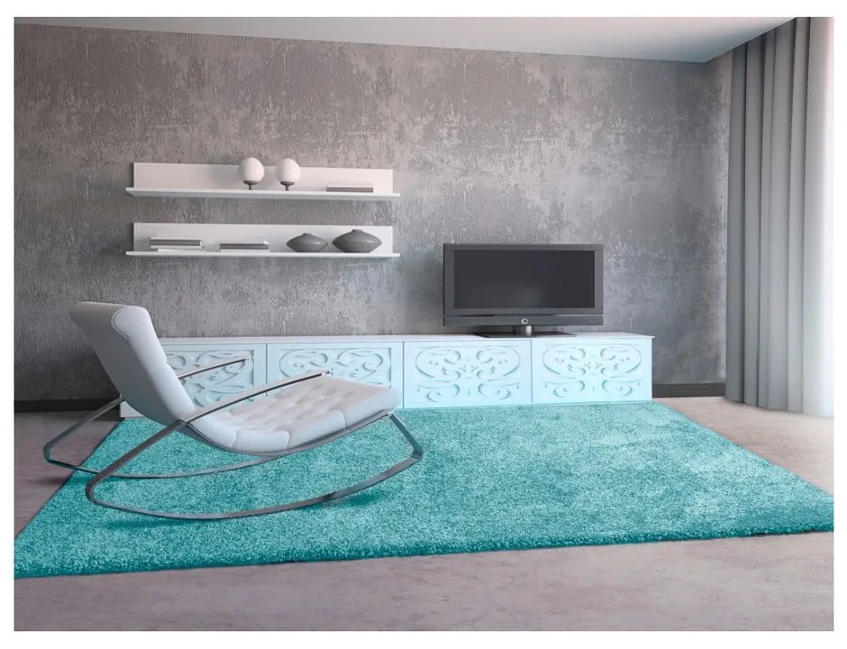 Jasnoniebieski dywan Universal Aqua, 57x110 cm