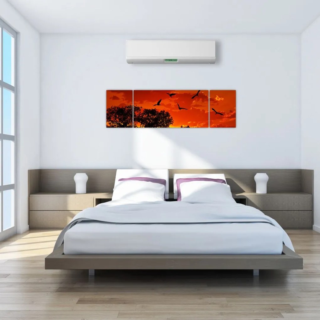 Obraz ptaków o zachodzie słońca (170x50 cm)