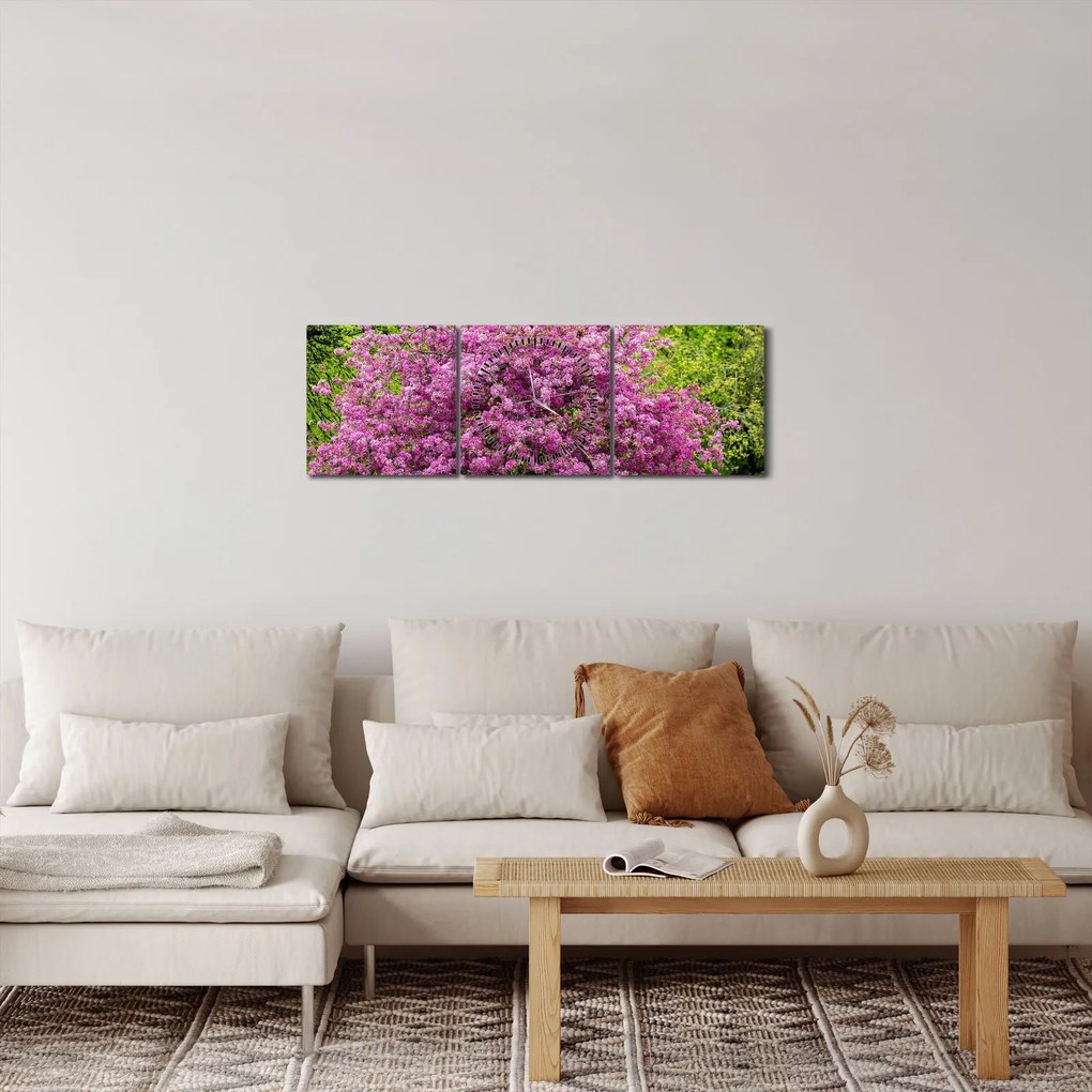 Obraz kwitnącego drzewa na łące (z zegarem) (90x30 cm)