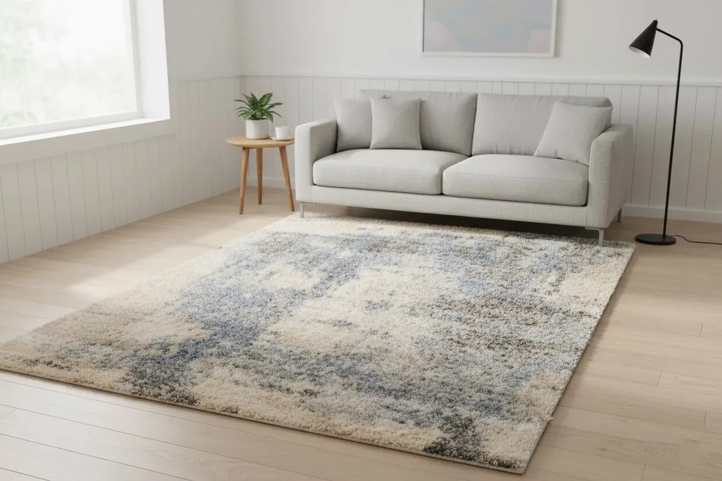 Prostokątny kremowy dywan w nowoczesnym wzorze S0-P72