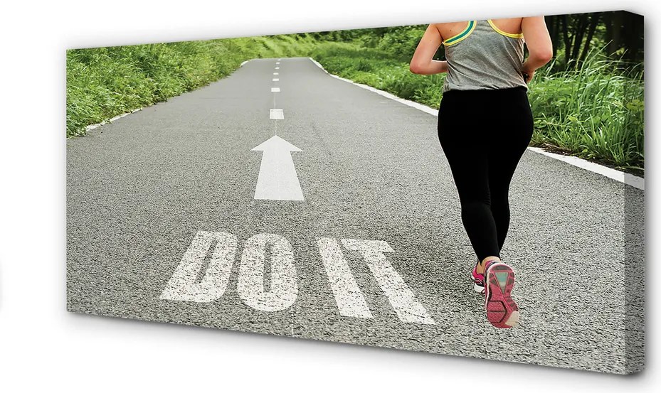 Obraz canvas na ścianę Kobieta Biegnąca Drogą