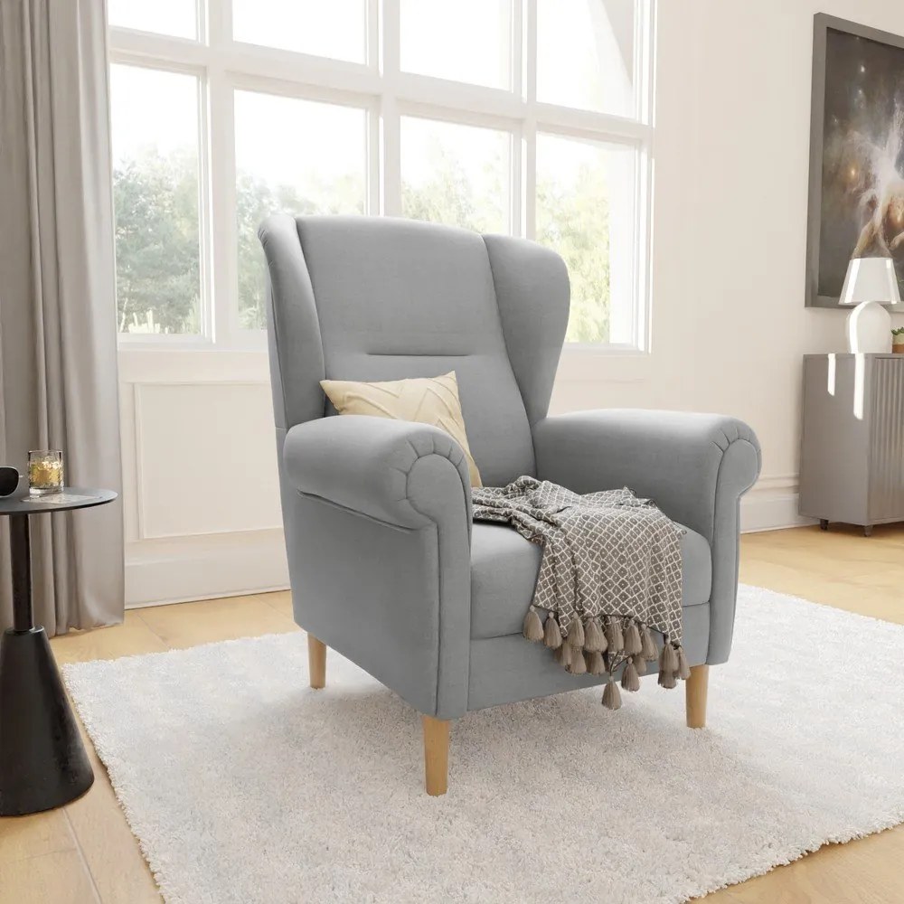 Jasnoszary fotel typu uszak Swan – Ropez