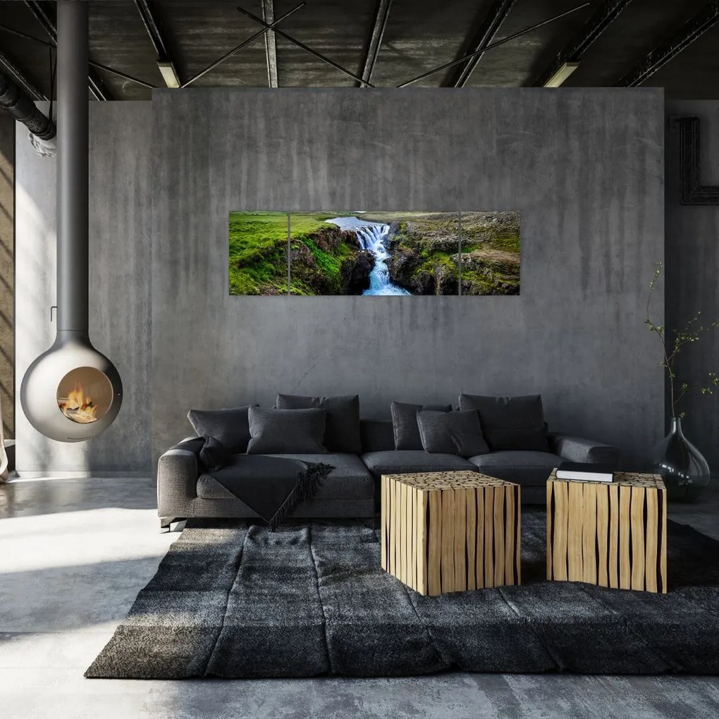 Obraz wodospadu między skałami (170x50 cm)