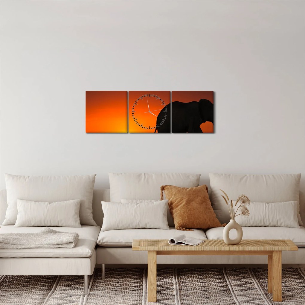 Obraz słonia o zachodzie słońca (z zegarem) (90x30 cm)