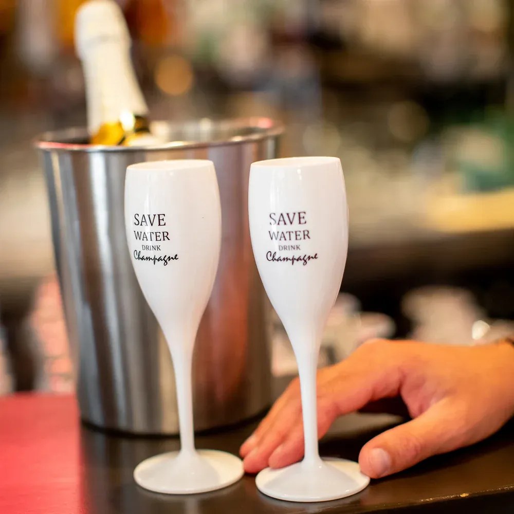 Koziol Kieliszek z napisem Save water drink champagne