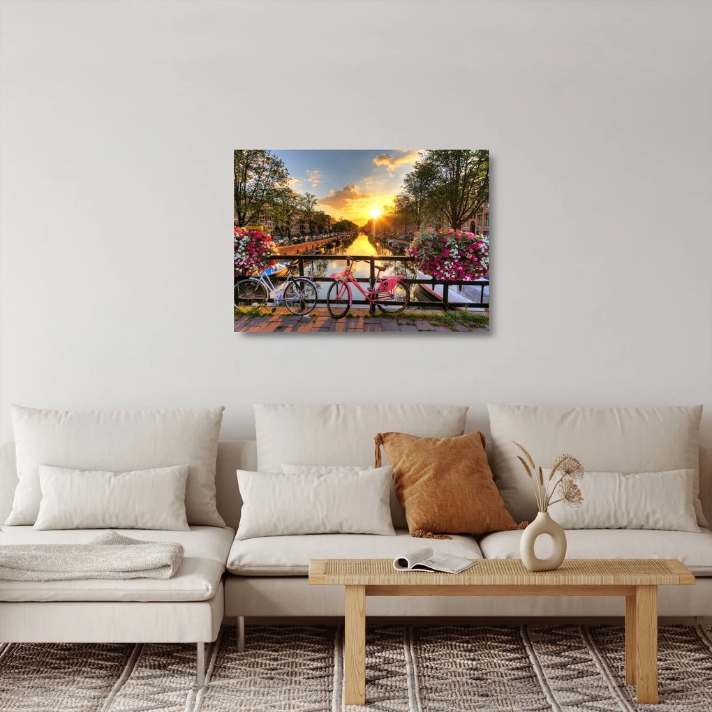 Obraz na szkle - Wschód słońca w Amsterdamie (70x50 cm)