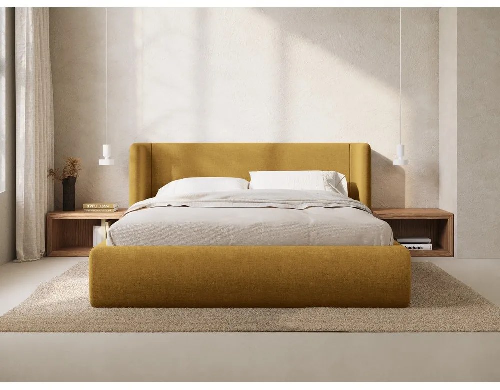 Musztardowe tapicerowane łóżko dwuosobowe ze schowkiem ze stelażem 180x200 cm Jason – Windsor &amp; Co Sofas
