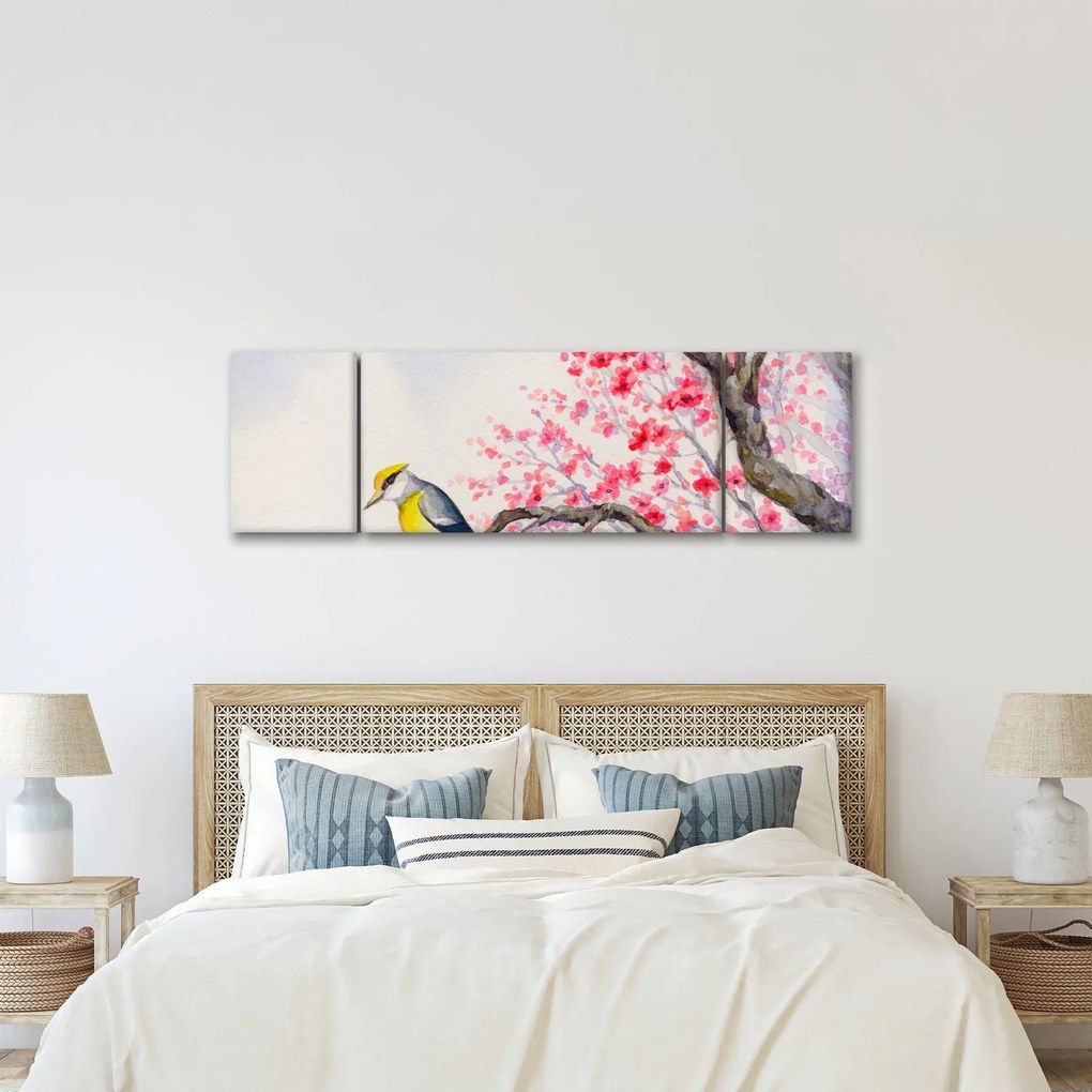 Obraz - ptak na drzewie z czerwonymi kwiatami (170x50 cm)