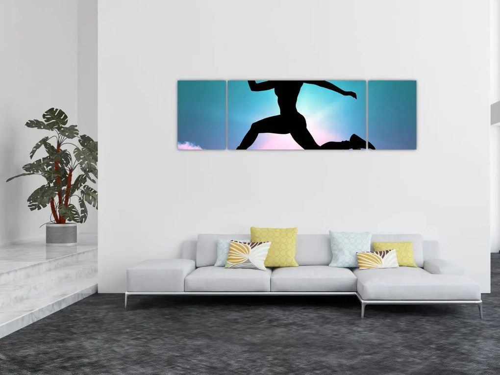 Obraz skaczącej sylwetki kobiety (170x50 cm)