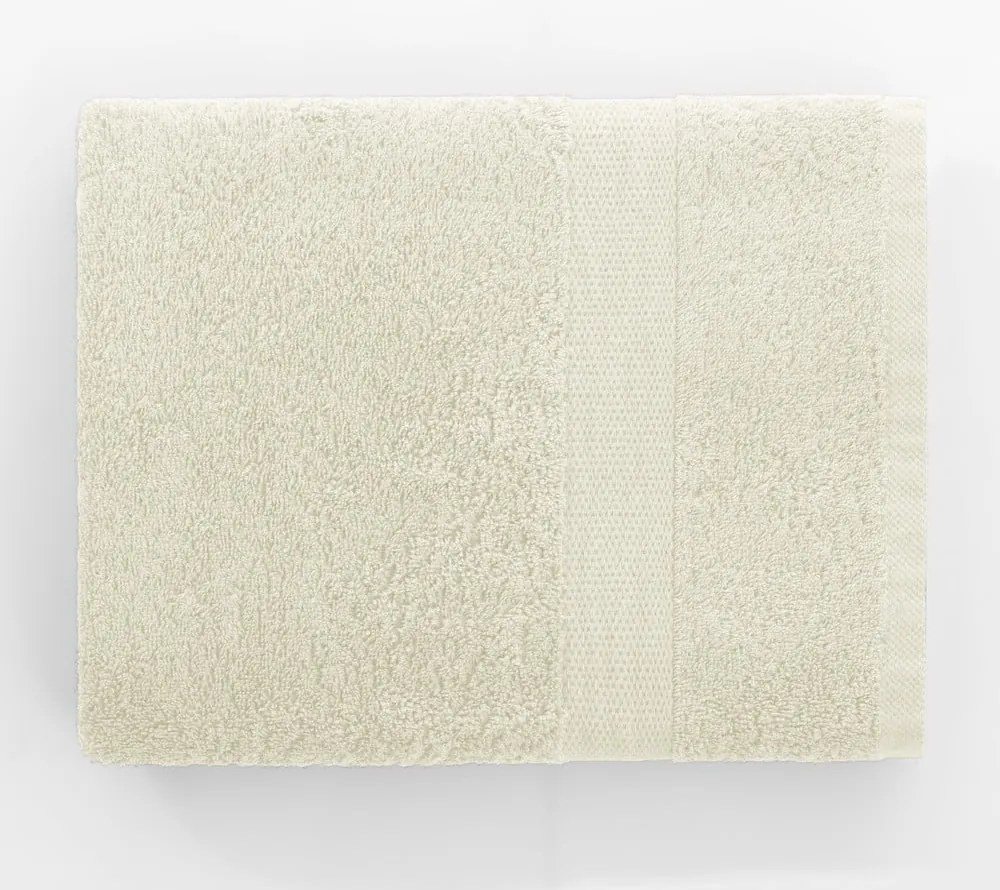 Kremowy bawełniany ręcznik frotte 30x50 cm Marina – DecoKing