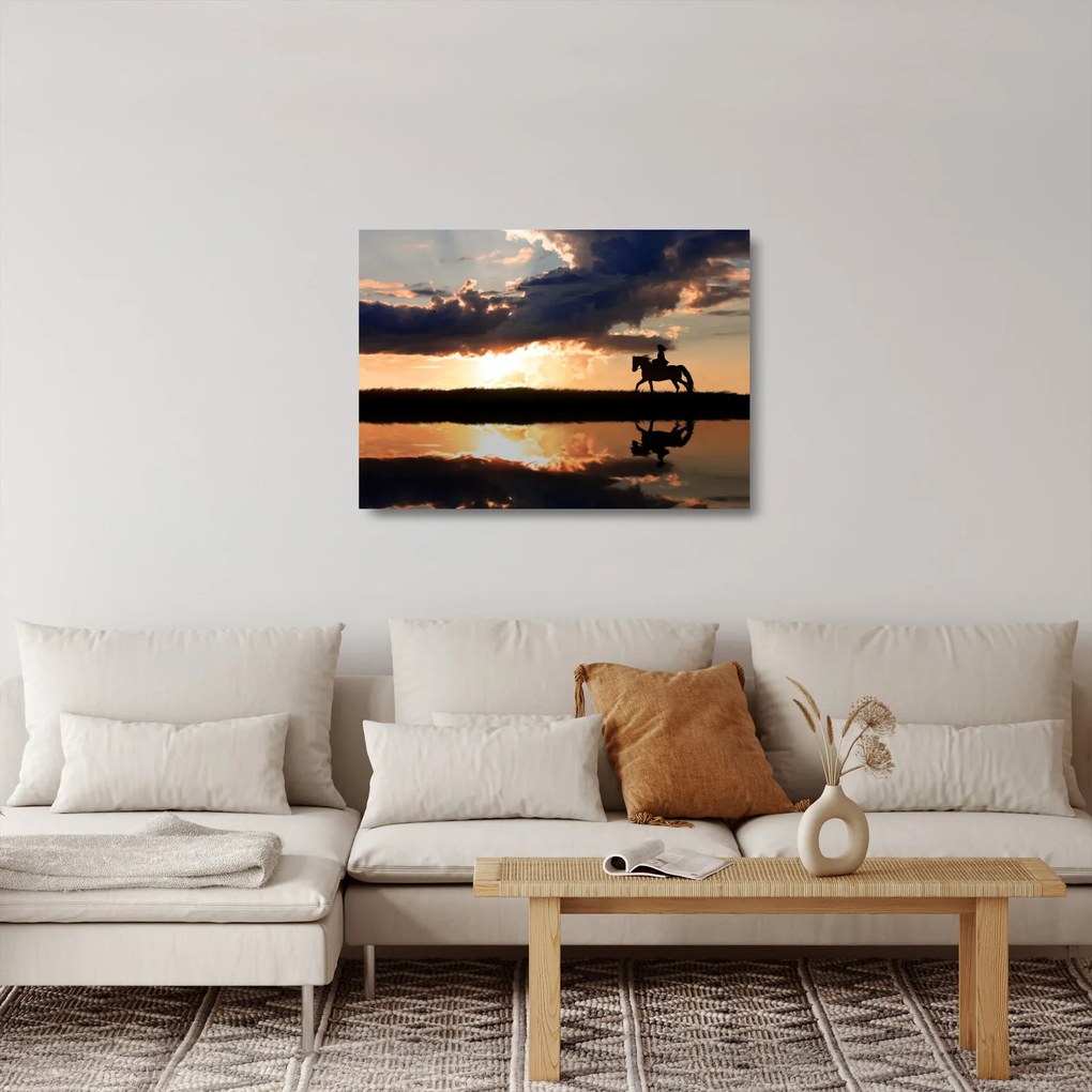 Obraz na szkle - Jeździec na koniu o zachodzie słońca (70x50 cm)