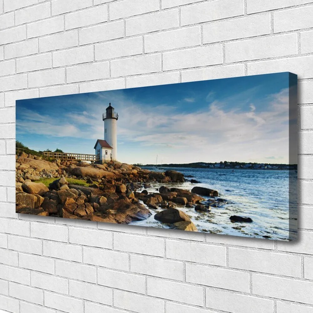 Obraz canvas Klasyczna Latarnia na Brzegu