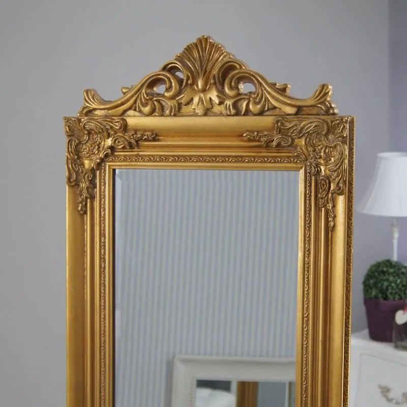 Lustro stojące, drewniana, złota rama, ornamenty.