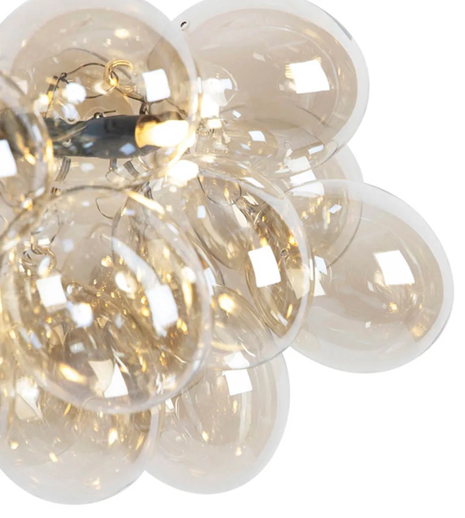 Wisząca lampa design czarna z bursztynowym szkłem 8 źródeł światła - Uvas.Designerski Oswietlenie wewnetrzne