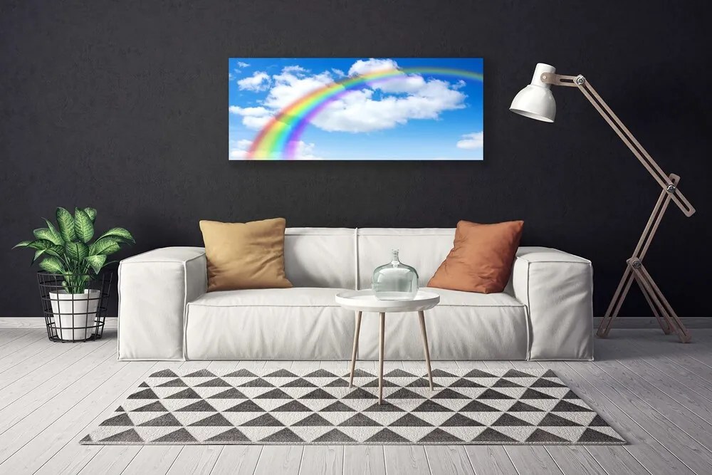 Obraz na płótnie Magiczna Tęcza nad Chmurami