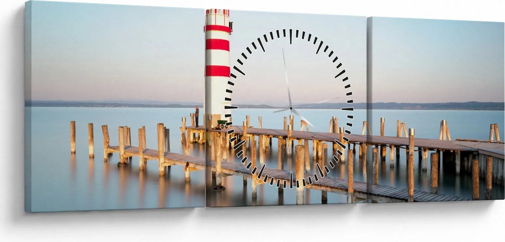 Obraz latarni morskiej o świcie (z zegarem) (90x30 cm)