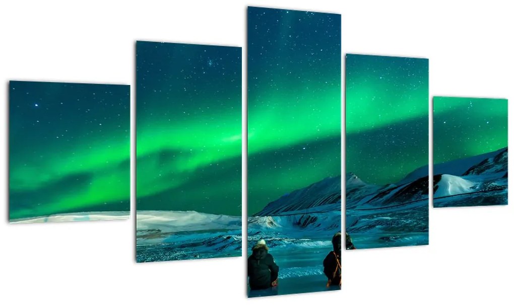 Obraz ludzi w pobliżu zorzy polarnej (125x70 cm)