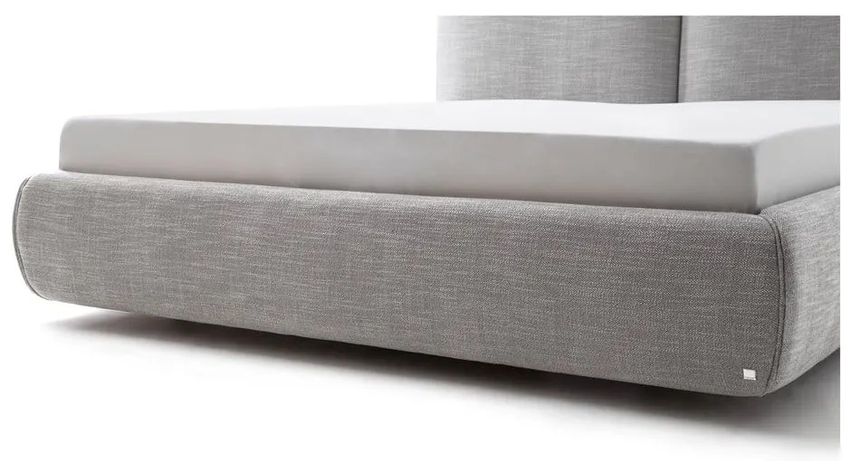 Szare tapicerowane łóżko dwuosobowe ze schowkiem i stelażem 180x200 cm Atesio – Meise Möbel