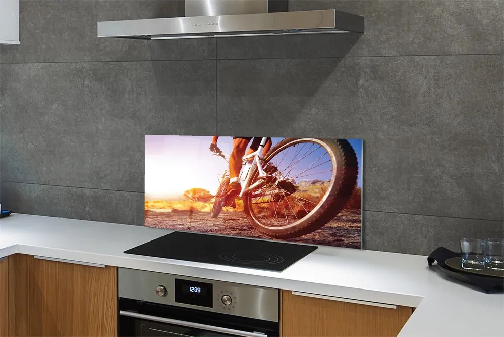 Panel szklany do Kuchni Rower na Górskiej Drodze o Zachodzie