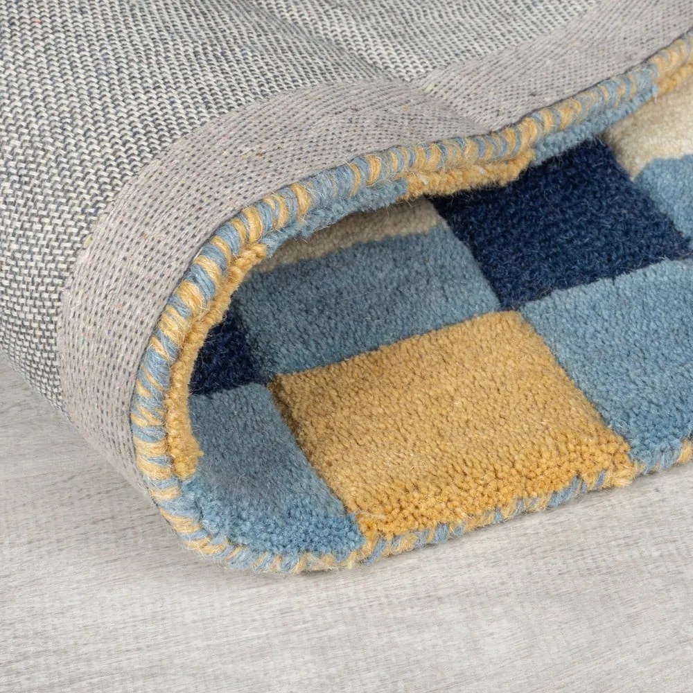 Niebieski wełniany chodnik tkany ręcznie 60x230 cm Kai Wool Border – Flair Rugs