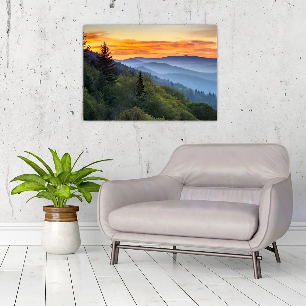 Obraz na szkle - Czerwone chmury w górach (70x50 cm)
