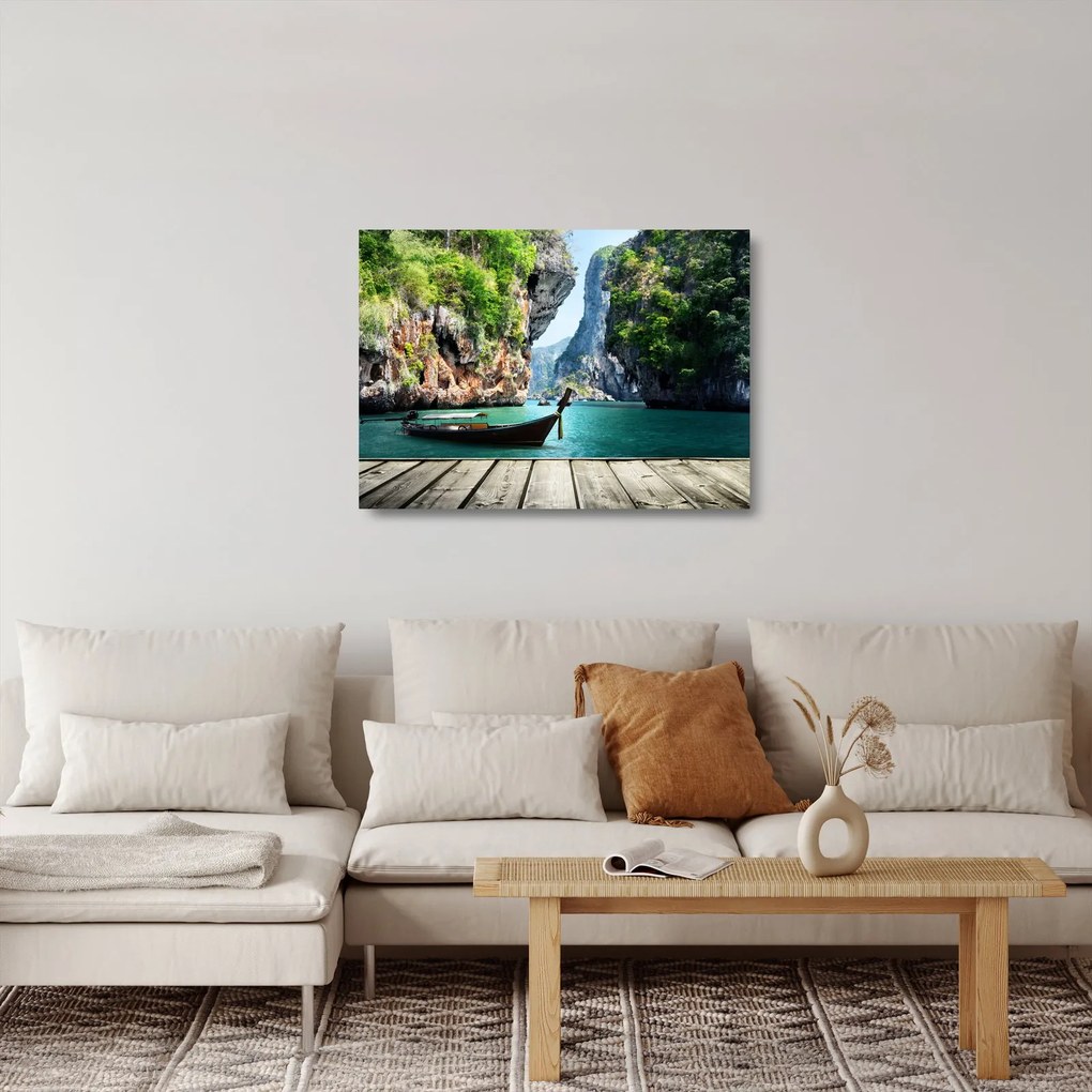 Obraz na szkle długiej łodzi na plaży (70x50 cm)