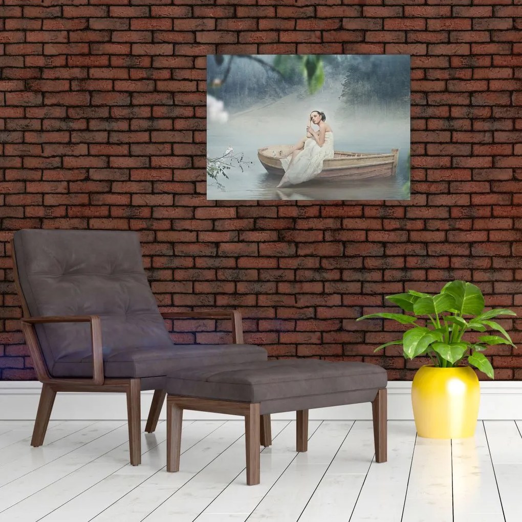 Obraz na szkle - Kobieta na łodzi (70x50 cm)
