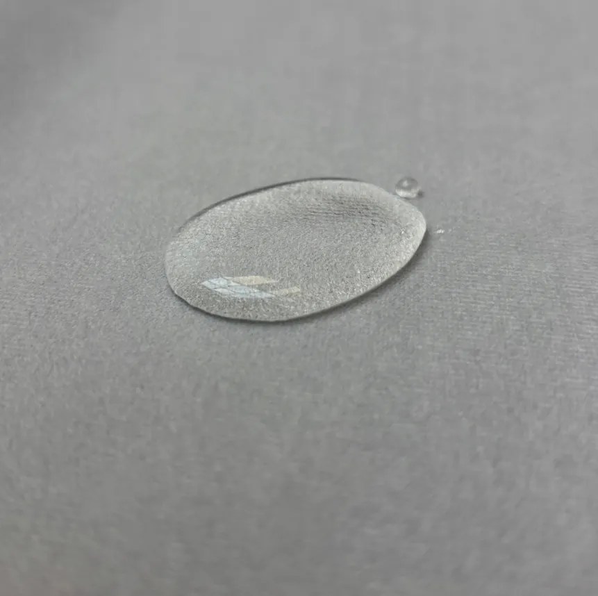 Rozkładana narożna sofa SILVIANO 230x140 cm, szara, uniwersalna