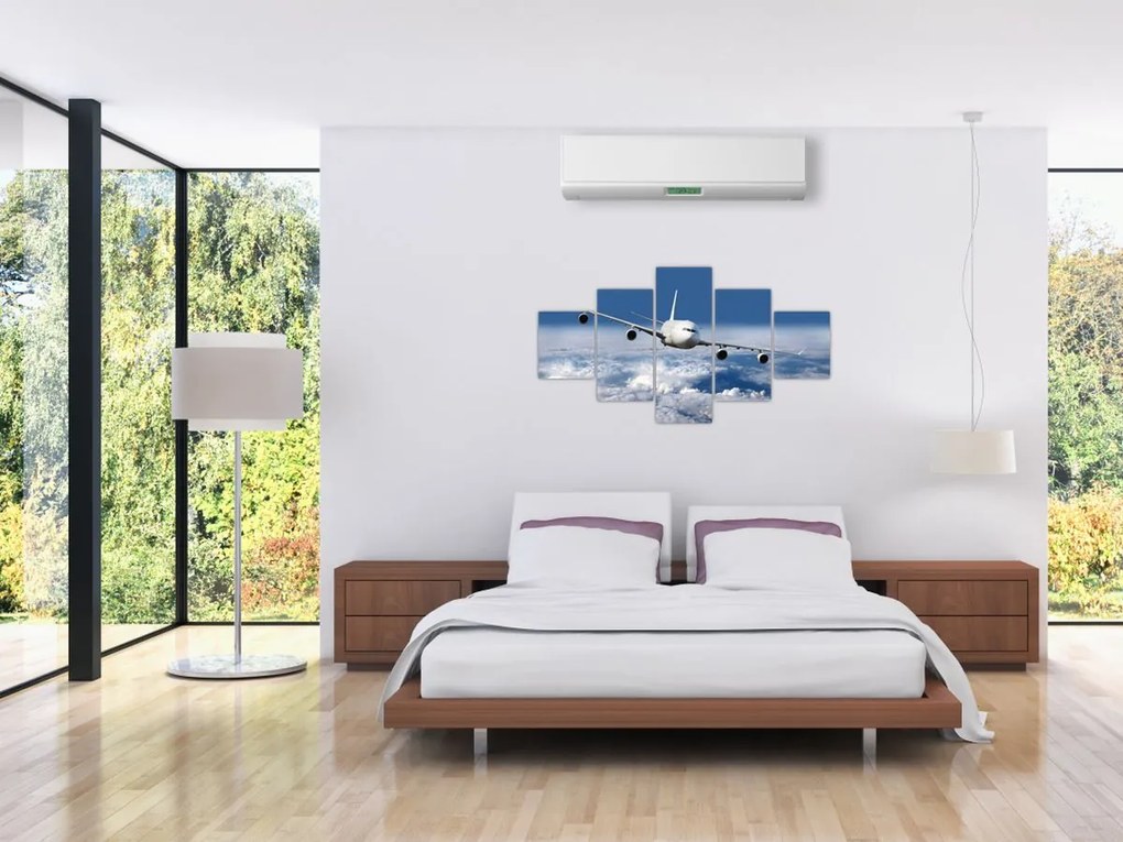 Obraz - Samolot w chmurach (125x70 cm)