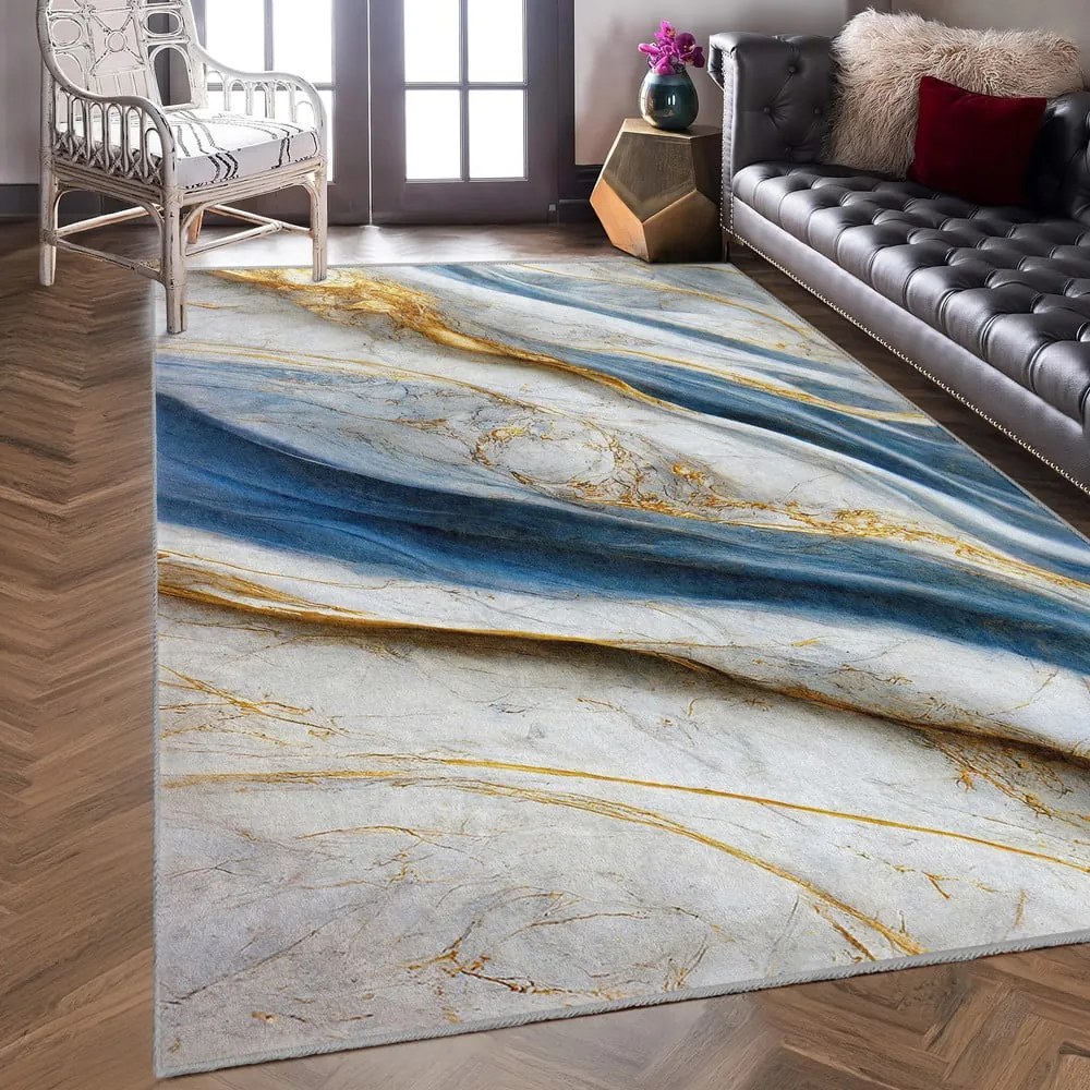 Niebieski dywan odpowiedni do prania 120x180 cm Golden Spill – Mila Home