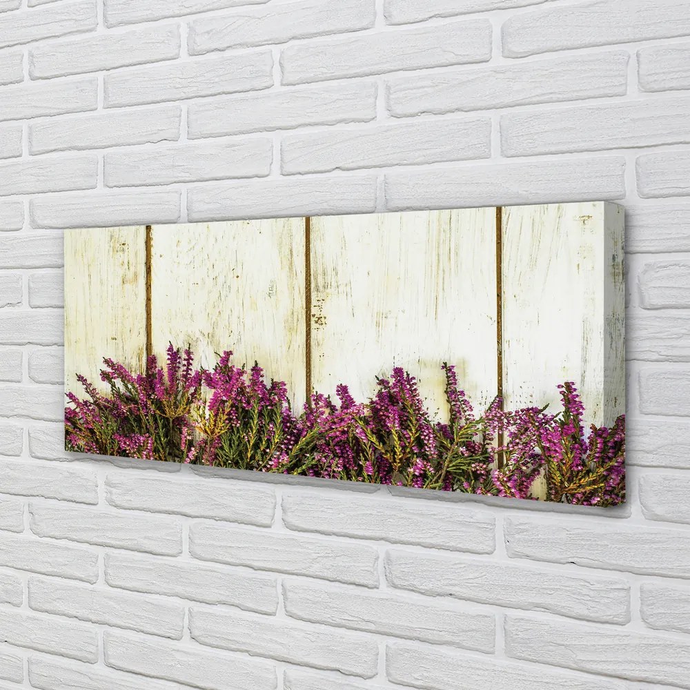 Fotoobraz na płótnie Fioletowe Kwiaty na Deskach