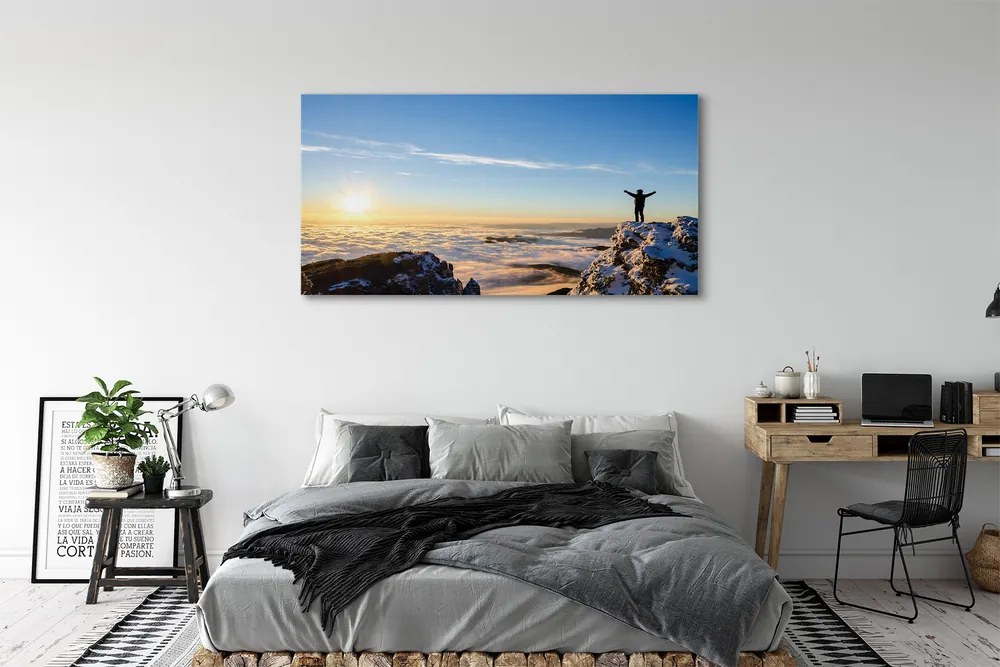 Obraz canvas na ścianę Człowiek w Górach o Wschodzie