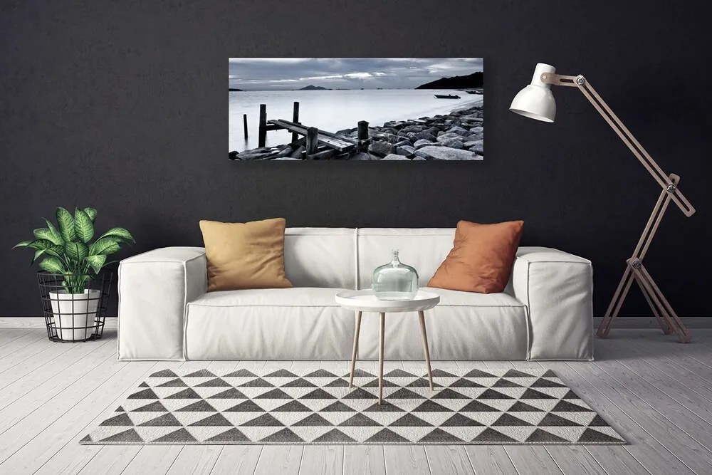 Obraz na płótnie Kamienista Plaża o Zmierzchu