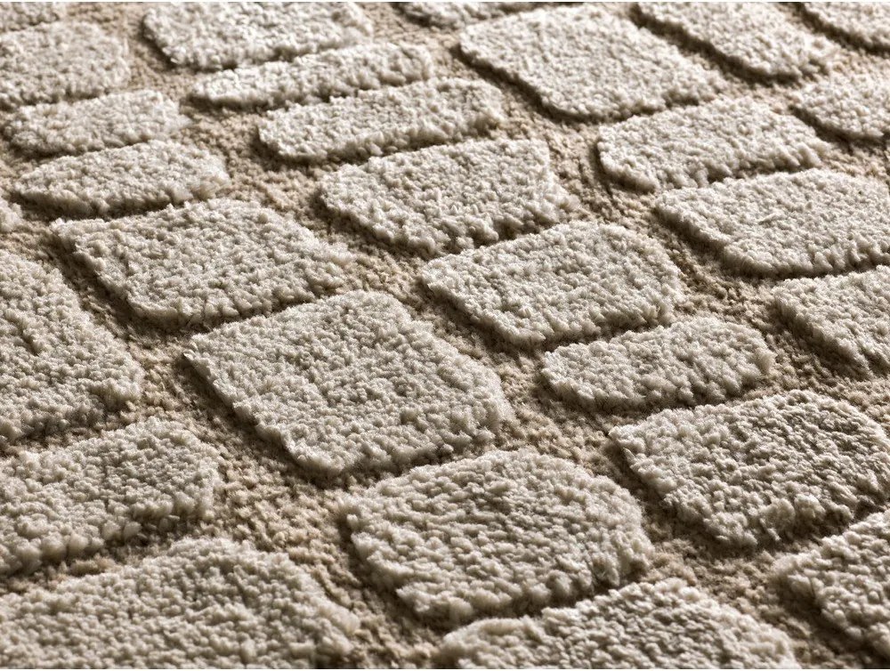 Beżowy dywan 64x120 cm Juno – Universal