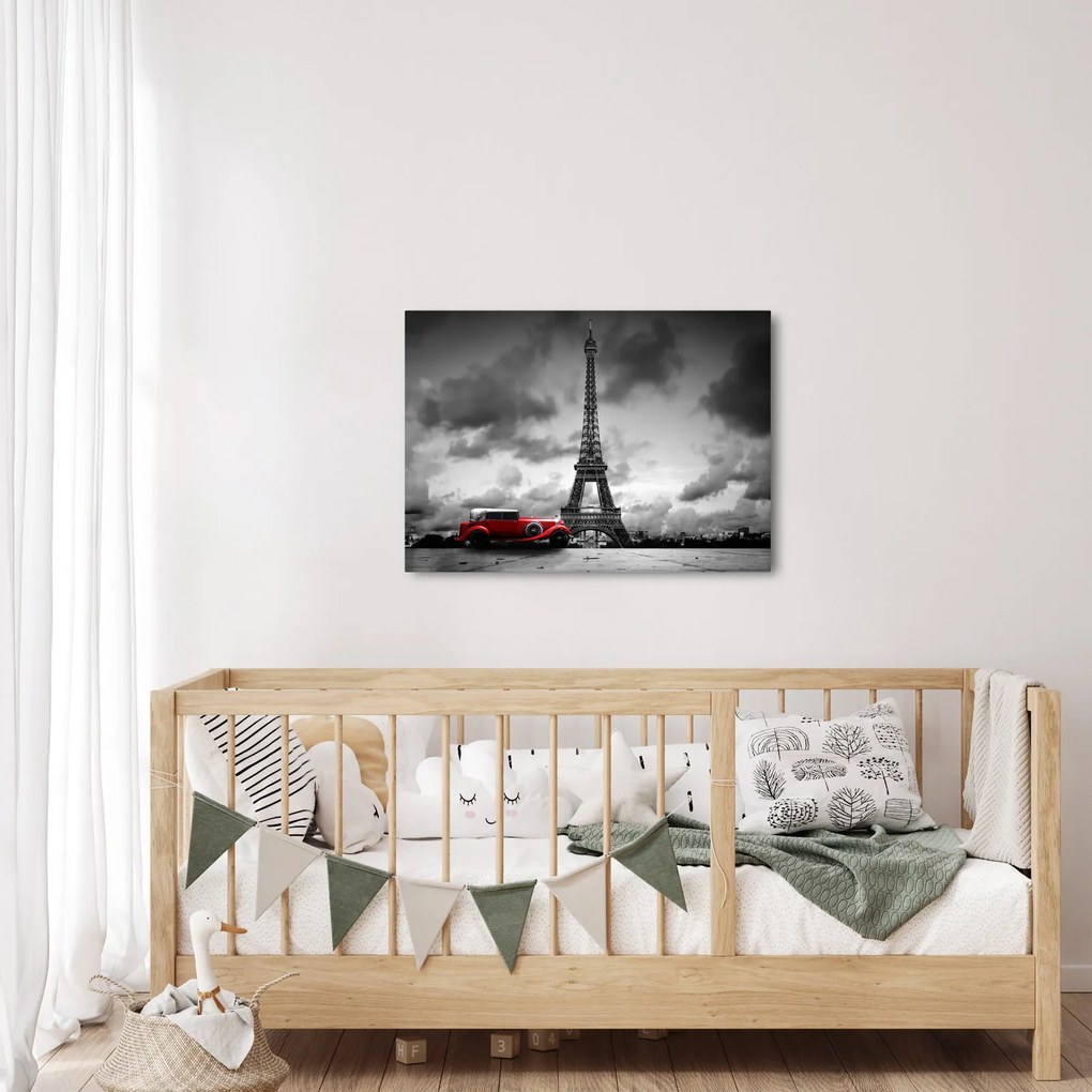 Obraz - Wieża Eiffla i czerwony samochód (70x50 cm)
