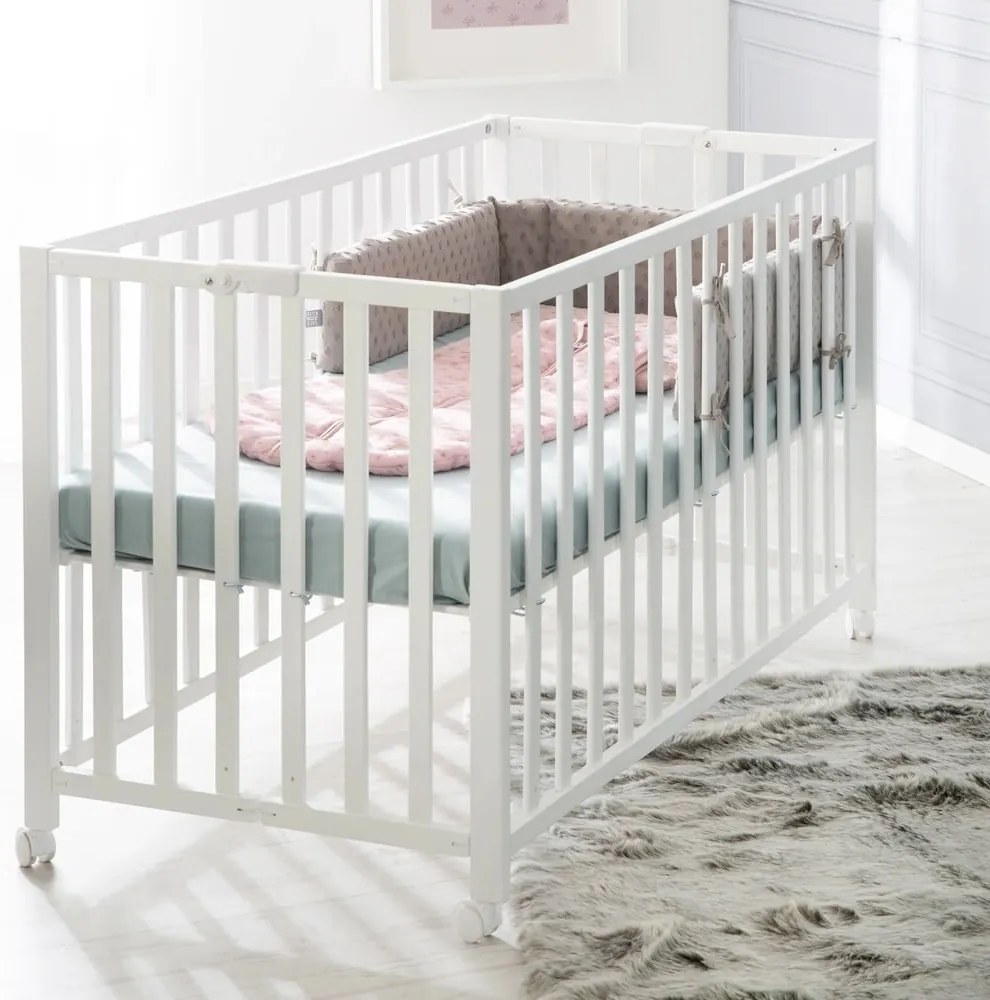 Białe łóżeczko na kółkach 60x120 cm Fold up – Roba