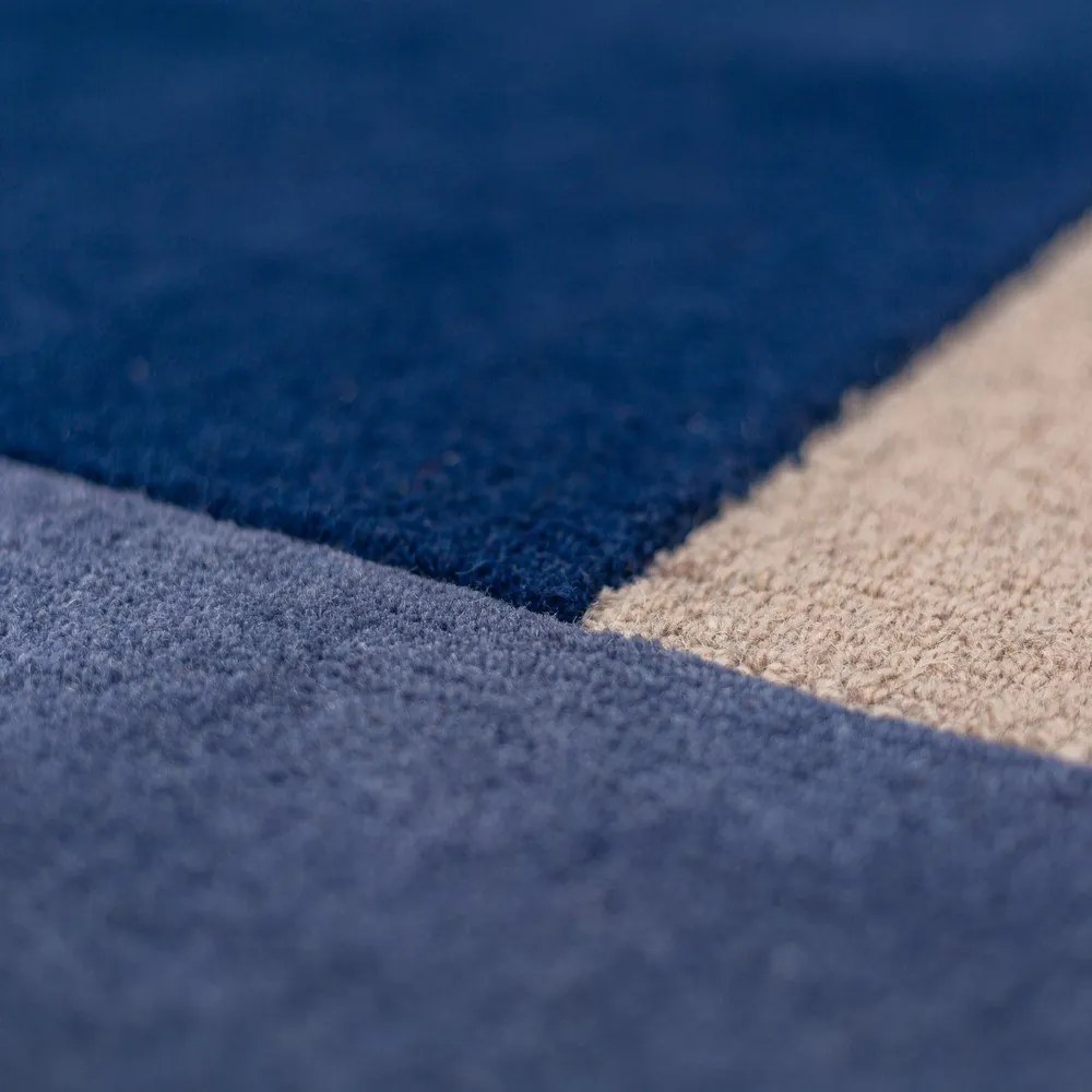 Niebieski wełniany okrągły dywan tkany ręcznie ø 150 cm Mia Segment – Flair Rugs