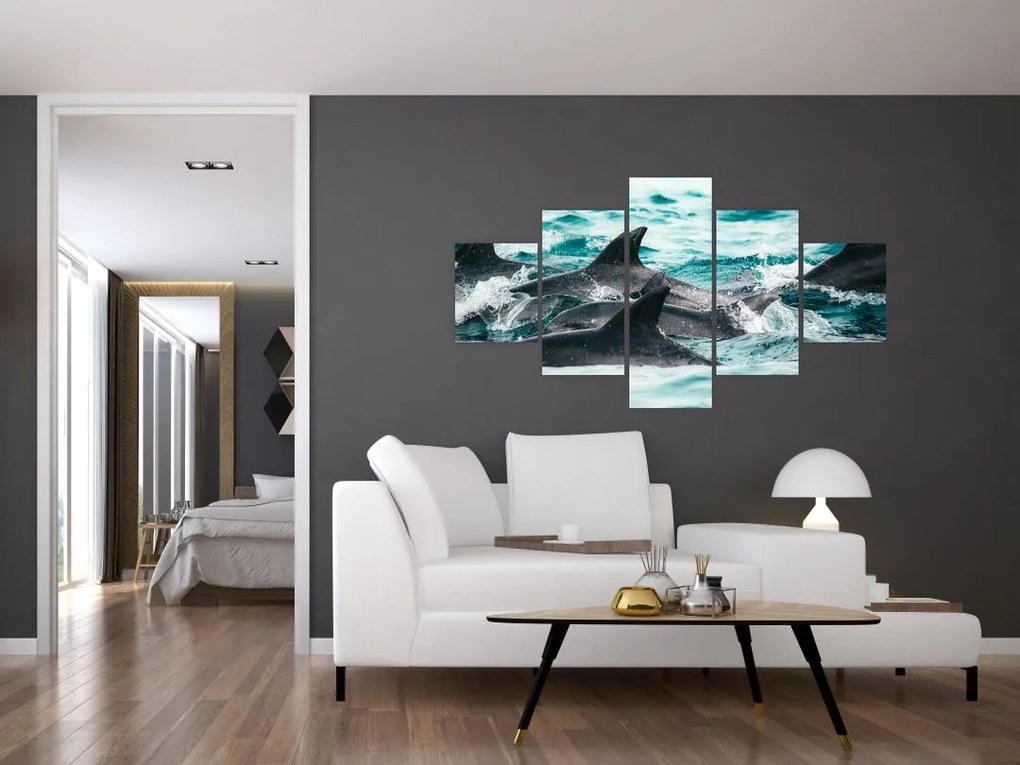 Obraz - Delfiny w oceanie (125x70 cm)