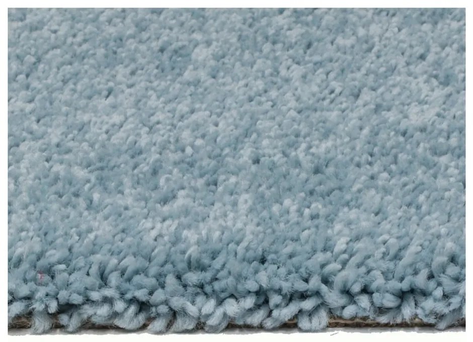 Jasnoniebieski dywan Universal Aqua, 57x110 cm