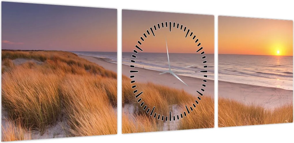 Obraz - Plaża o zachodzie słońca (z zegarem) (90x30 cm)