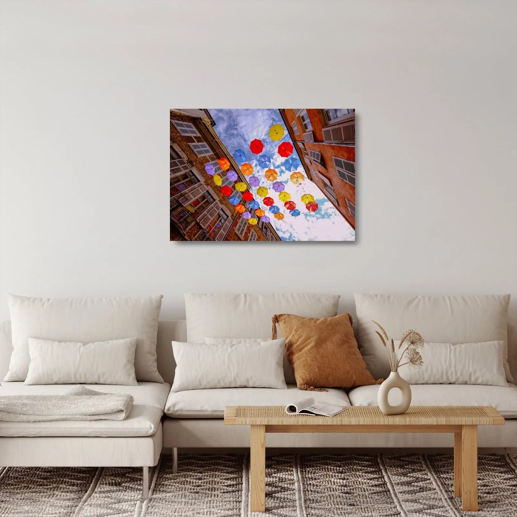 Obraz na szkle kolorowych parasoli (70x50 cm)