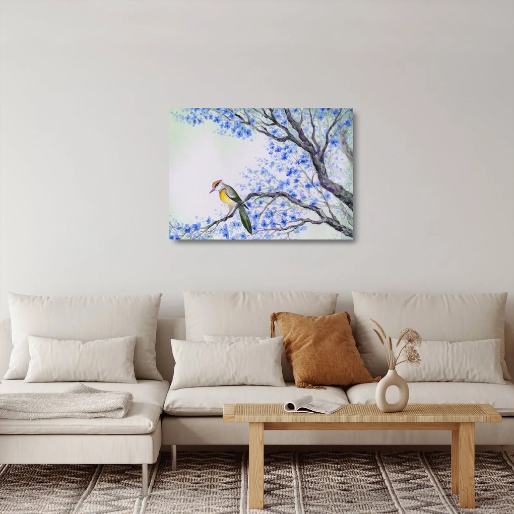 Obraz na szkle - ptak na drzewie z niebieskimi kwiatami (70x50 cm)